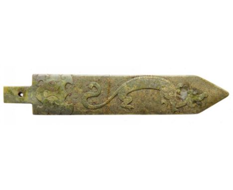 A CHINESE RITUAL  JADE GE BLADE  carved to both sides in shallow relief with a dragon, taotie at the forte, on a fine key fre