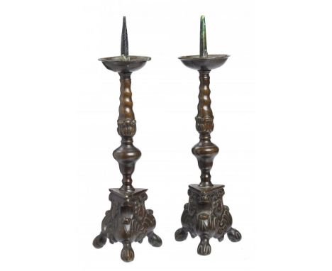 TWO FLEMISH BRONZE PRICKET CANDLESTICKS, 19TH C  in early 17th c style, iron spike, 39cm h++Good condition