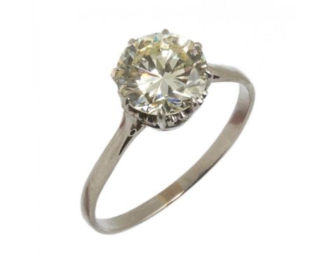 A DIAMOND SOLITAIRE RING the claw-set brilliant cut diamond approx 2 ct, M colour, VVS clarity, in gold, 3g, size R ++In good