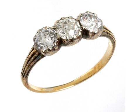 AN OLD CUT DIAMOND RING the three old brilliant cut diamonds approx 1.8 ct, G/H colour, VS2/SI1 clarity, in gold with reeded 