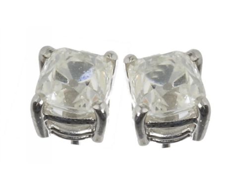 A PAIR OF OLD MINE CUT DIAMOND SOLITAIRE EARRINGS one diamond approx 1.04 ct, H/I colour, VS2 clarity, the other approx 1.03 