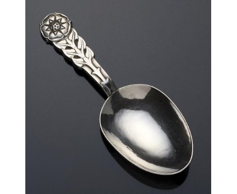 AN ARTS &amp; CRAFTS SILVER CADDY SPOON BY REX STONE  10cm l, mark of R E Stone and facsimile signature, London 1960, 1oz++Fi