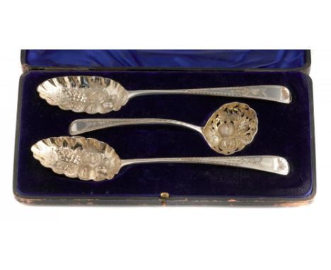 TWO GEORGE III SILVER TABLESPOONS AND A SAUCE LADLE later bright cut, engraved and parcel gilt as a Berry set, by various mak
