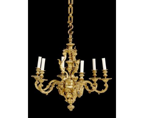 AN ENGLISH GILT BRONZE CHANDELIER IN THE MANNER OF LENYGON AND MORANT, EARLY 20TH C of six lights on scrolling gadrooned bran