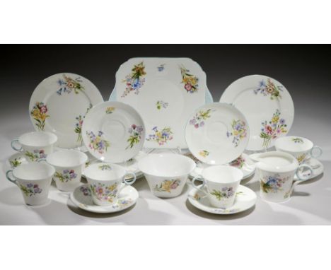 A SHELLEY BONE CHINA TEA SERVICE, SECOND QUARTER 20TH C      Wild Flowers pattern, the service including a square plate 24cm 