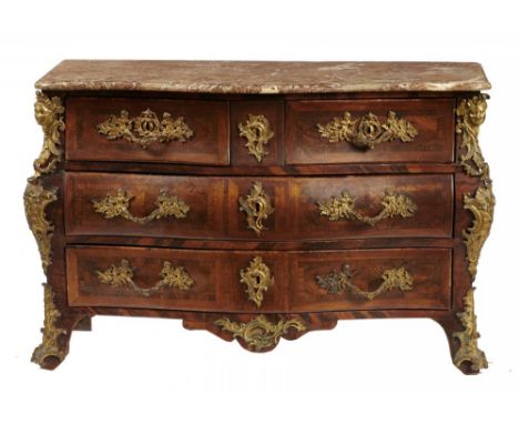 A LOUIS XV ORMOLU MOUNTED KINGWOOD AND ROSEWOOD COMMODE, C1750 with  Rance marble slab above five oak lined drawers, 85cm h; 