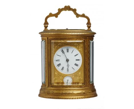 AN OVAL FRENCH GILT BRASS  PETITE SONNERIE CARRIAGE CLOCK, LATE 19TH C  with enamel dial, alarm dial, Breguet hands, engraved