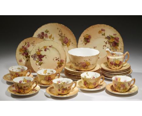 A ROYAL WORCESTER TEA SERVICE, 1906 AND C  printed and  painted with flowers on a shaded apricot ground, pair of plates 22cm 