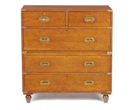 CAMPAIGN FURNITURE.  A VICTORIAN TEAK MILITARY CHEST OF DRAWERS, 19TH C  in two sections with brass mounts, locks and flush h