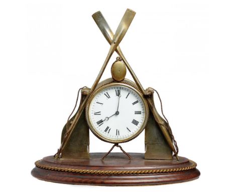 ROWING.  AN UNUSUAL VICTORIAN GILTMETAL TIMEPIECE, C1880  the drum cased French movement with enamel dial and Breguet hands f