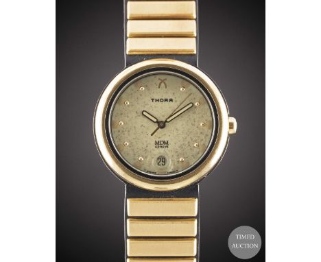 A GENTLEMAN'S SIZE 18K SOLID YELLOW GOLD &amp; KEVLAR THORA MDM GENEVE AQUATITE BRACELET WATCH

CIRCA 1990s, REF. 2105.355 WI