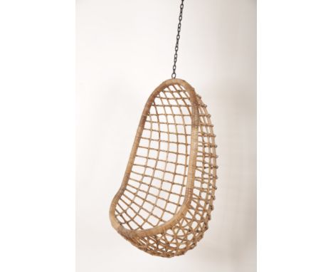 A MID CENTURY DESIGN SWINGING 'EGG' CHAIRthe rattan and bamboo seat hanging from a cast iron chain, the seat 110cm high x 63c