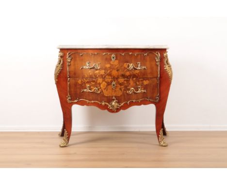 A MARQUETRY AND GILT METAL MOUNTED COMMODE OF LOUIS XVI DESIGN20th century, of Bombe outline, the marble top over two long dr