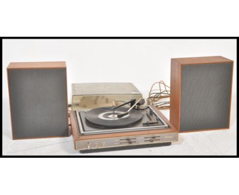 A vintage retro 20th Century teak cased Dansette record player Model No A4005, fitted with a BSR record deck having matching 