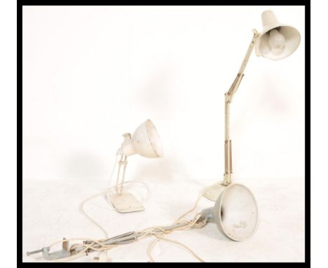 A group of three vintage retro 20th Century industrial desk lamps to include a 1001 lamps example in white, a smaller white e
