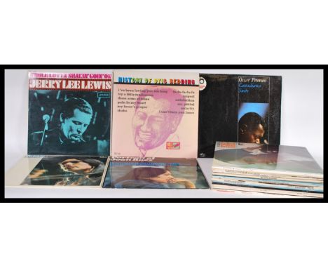 A collection of vinyl long play LP records featuring various artists of mainly folk genre to include Surfin With Bo Diddley, 