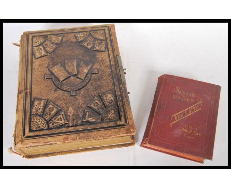 An antique 19th Century Victorian family portrait photograph album along with a Souvenir de l Italie of Florence. The album c