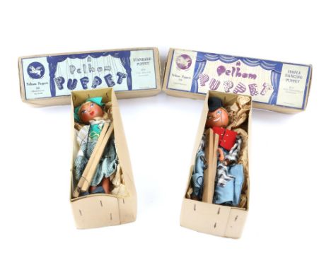 2 Pelham Puppets - a standard puppet and a simple dancing puppet, both in original boxes with instructions. (2)