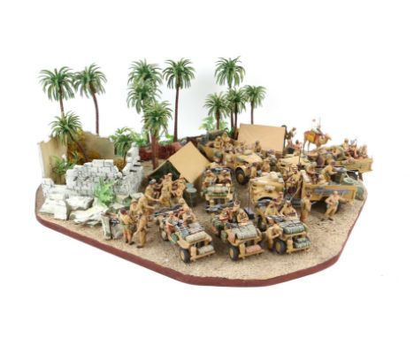 Large diorama of a desert army camp including Long Range Desert Group LRDG vehicles including Jeeps and Chevrolets, with figu