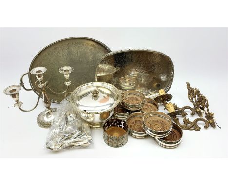 A pair of bronzed wall sconces, together with a selection of silver plate, to include six bottle coasters, candelabra, two tr