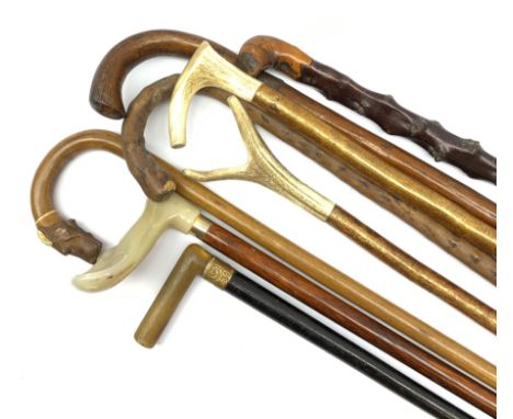 Edwardian ladies parasol having burgundy canopy and leather handle with gilt metal collars, 19th century evening walking cane