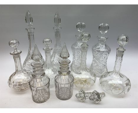 Five pairs of glass decanters, to include a pair of Georgian triple ring neck decanters with spire stoppers, late cut example