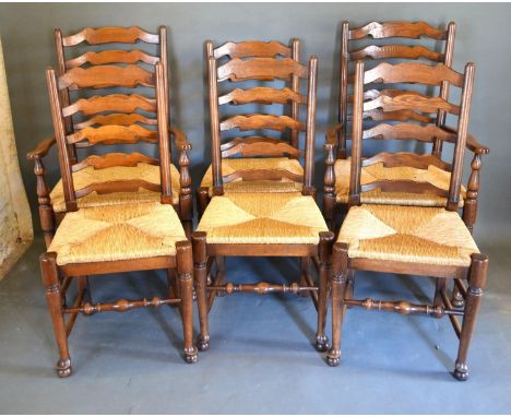 A Set of Six Reproduction Oak Ladder Back Dining Chairs to match the previous lot with removal rush seats raised upon turned 