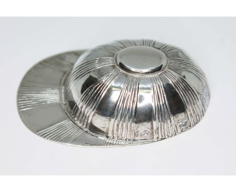 A novelty caddy spoon modelled as a jockey's cap, marked '925 Sterling', length 55mm.  