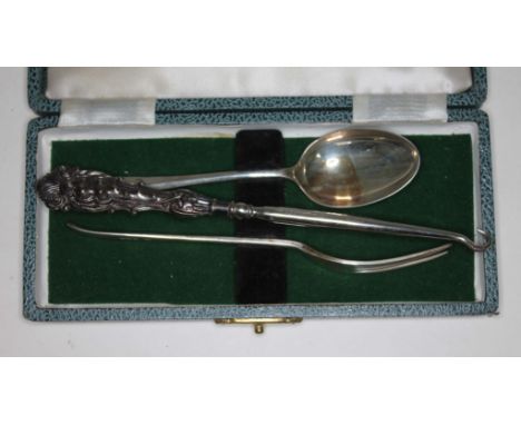 A hallmarked silver Christening fork and spoon, together with a silver handle button hook.  
