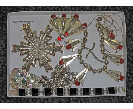 A tray of assorted costume jewellery including a marcasite and black slab set bracelet marked '925', a chain marked '925' wit