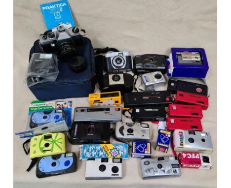 A box of assorted cameras to include a Praktica Nova II with extra lense and flash in case, An Halina Zippy F Disc 102 in box