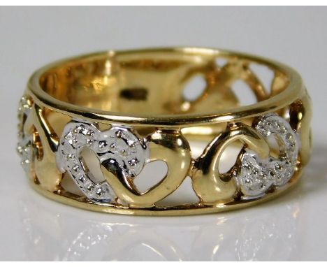 A 9ct gold ring with fretwork banding set with diamond 2.7g Size N/O