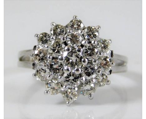 An 18ct white gold diamond cluster ring set with approx. 1.64ct diamond 5g size P/Q