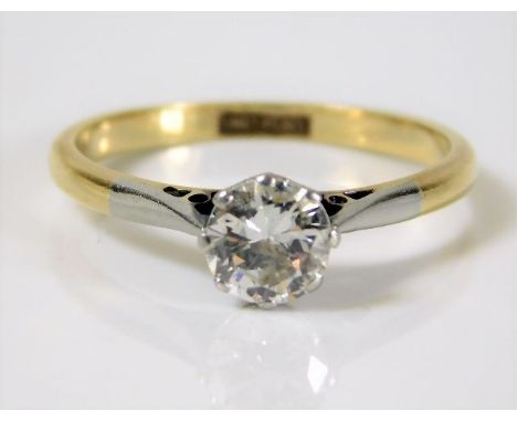 An 18ct gold diamond solitaire ring set with platinum mounted 0.75ct diamond of good colour &amp; clarity 2.5g size O