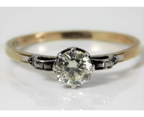 An art deco 18ct gold diamond solitaire ring with platinum mounted diamond of 0.75ct, 2.4g size S