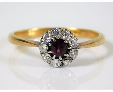 An 18ct gold ring diamond &amp; ruby ring set with 0.4ct diamond 3g T
