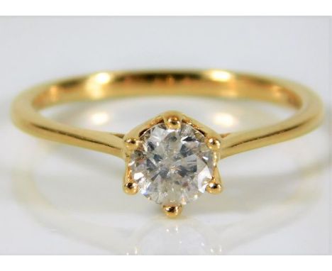 An 18ct gold ring set with H colour 0.6ct diamond &amp; certificate 2.3g size N