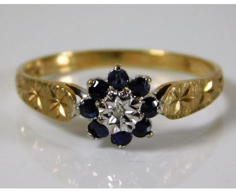 A 9ct gold ring set with diamond &amp; sapphire 1.8g size R