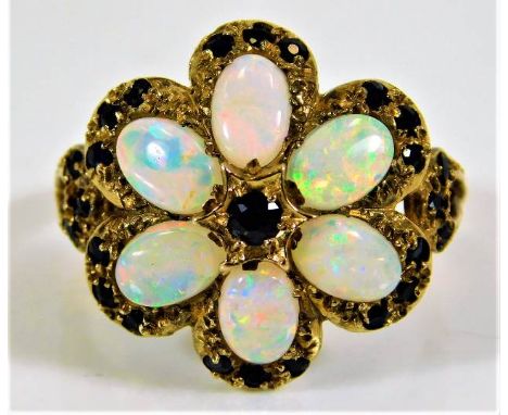 A 9ct gold ring set with sapphire and opals 4.6g size N