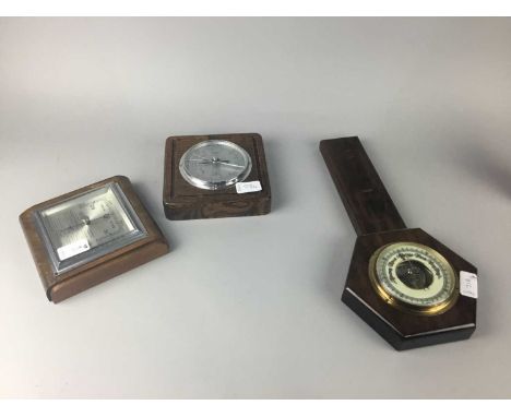 ANNIVERSARY CLOCK, along with a wheel barometer and two other barometers (4)