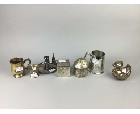 SHEFFIELD PLATED CHAMBER CANDLESTICK,along with a group of plated money banks, mugs and egg cup