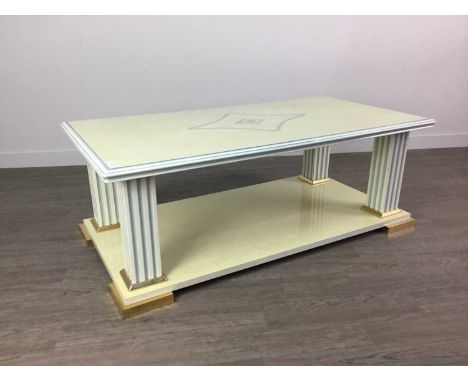 ITALIAN DESIGNER COFFEE TABLE,of Neo-Classical design, with light blue and gilt detail, on fluted square supports, 120cm wide