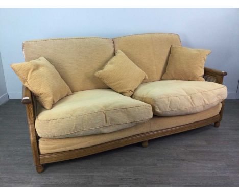 ERCOL OAK CANE PANELLED SETTEE,along with matching chair