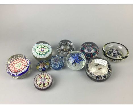 NINE GLASS PAPERWEIGHTS,including and millefiori and faceted examplesCondition report: Some scratches, otherwise light genera
