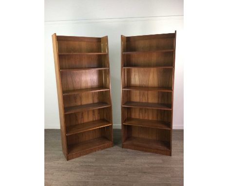 PAIR OF TEAK OPEN BOOKCASES,186cm highCondition report: 80cm wide, shelves are adjustable; these cases are of slight waterfal