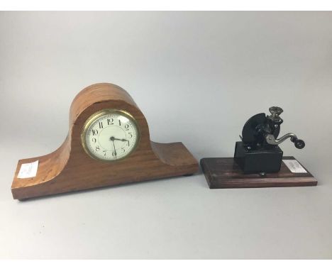 EARLY 20TH CENTURY AMERICAN AUTOMATIC PENCIL SHARPENER,on a wood plinth, the plinth 20.5cm wide, along with a mantel clock (2