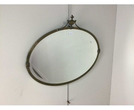 BRASS OVAL WALL MIRROR,77cm wideCondition report: Some rubbing to brass coloured finish and light general wear overall but no