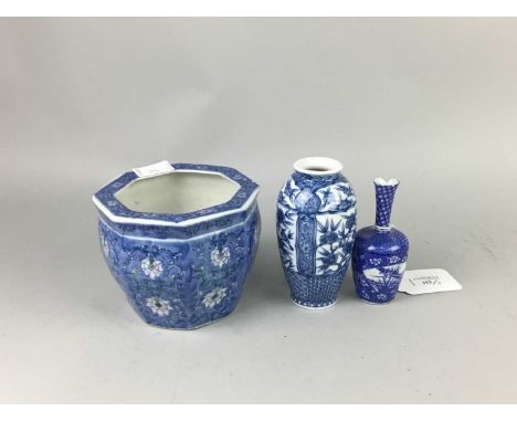 THREE PIECES OF JAPANESE BLUE &amp; WHITE PORCELAIN,comprising two vases and a planter