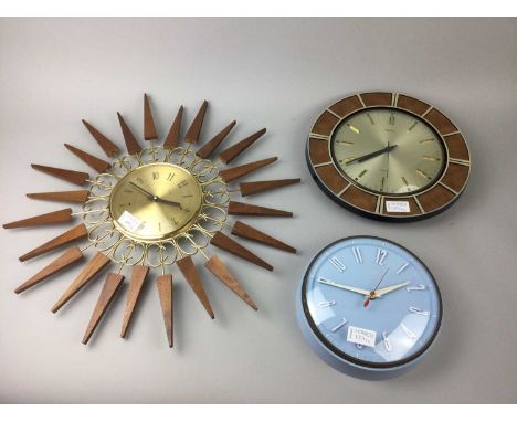 PAICO STARBURST WALL CLOCK,53cm wide, along with three other wall clocks, including two Metamec examples (4)Condition report: