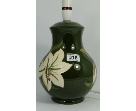 Moorcroft large lamp base decorated with Lily on green ground , height 34cm